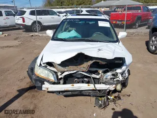 2002 Honda Accord Sdn EX with VIN 1HGCG566X2A106388, listed as a IAAI auction lot 41762046 with 227,512 mi miles. Bid and sale history available at carsss.com. Image 13.