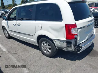 2012 Chrysler Town & Country Touring with VIN 2C4RC1BG5CR291815, listed as a IAAI auction lot 42147129 with 167,982 mi miles and . Bid and sale history available at DreamBid. Image 3.