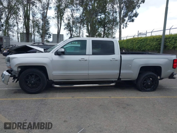 2017 Chevrolet Silverado 1500 LT with VIN 1GCPCREC9HF134351, listed as a IAAI auction lot 41910972 with 185,359 mi miles and . Bid and sale history available at DreamBid. Image 14.