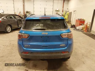 2018 Jeep Compass Altitude with VIN 3C4NJDBB5JT345165, listed as a IAAI auction lot 41618844 with 66,226 mi miles and . Bid and sale history available at carsss.com. Image 16.