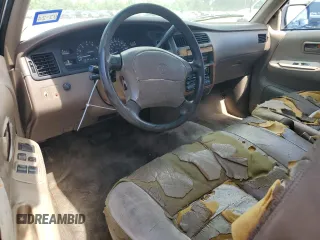 1995 Toyota T100 SR5 z VIN JT4VD12F1S0014445, wystawiony jako Copart lot #59764864 z przebiegiem 184 947 mil mil oraz Szkody całkowita. Historia ofert i sprzedaży dostępna na DreamBid. Obrazek 8.