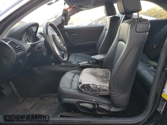 2010 BMW 1 Series 128i with VIN WBAUP9C5XAVL89207, listed as a Copart auction lot 80018904 with 124,842 mi miles and Salvage Title. Bid and sale history available at DreamBid. Image 7.
