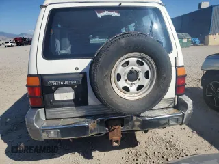 1995 Mitsubishi Montero z VIN JA4MR41H3SJ004800, wystawiony jako Copart lot #72036354 z przebiegiem 209 635 mil mil oraz Szkody całkowita. Historia ofert i sprzedaży dostępna na DreamBid. Obrazek 6.