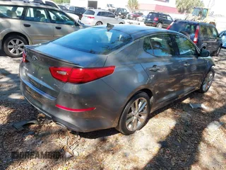 2014 Kia Optima SXL Turbo with VIN 5XXGR4A69EG284510, listed as a IAAI auction lot 41901608 with 81,877 mi miles and . Bid and sale history available at DreamBid. Image 4.