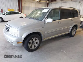 2003 Suzuki XL7 Touring z VIN JS3TX92V434101918, wystawiony jako IAAI lot #42750098 z przebiegiem 261 451 mil mil oraz . Historia ofert i sprzedaży dostępna na DreamBid. Obrazek 2.