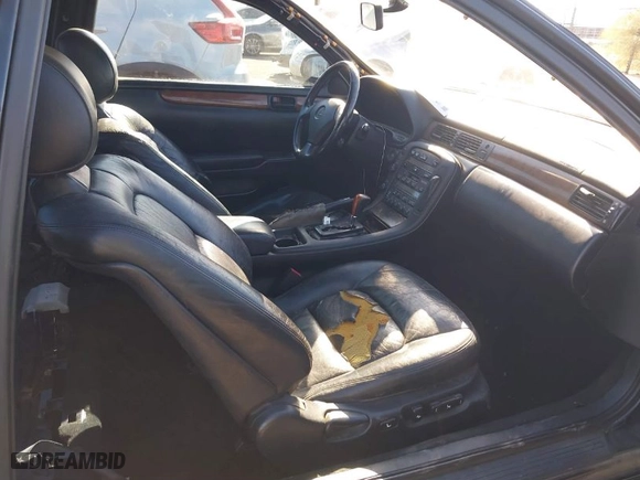 1999 Lexus SC 400 Luxury Sport Cpe with VIN JT8CH32Y4X1002413, listed as a IAAI auction lot 41331493 with 163,061 mi miles. Bid and sale history available at carsss.com. Image 5.