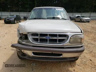 1997 Ford Explorer XL with VIN 1FMDU32E8VUC60285, listed as a Copart auction lot 66154644 with 219,066 mi miles and Salvage title. Bid and sale history available at DreamBid. Image 5.