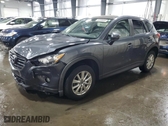 2016 Mazda CX-5 Touring z VIN JM3KE4CY5G0852073, wystawiony jako Copart lot #56599055 z przebiegiem 72 167 mil mil oraz Szkoda całkowita • Salvage title. Historia ofert i sprzedaży dostępna na DreamBid. Obrazek 1.