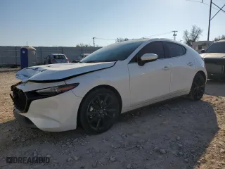 2019 Mazda Mazda3 Hatchback w/Premium Pkg with VIN JM1BPBNM2K1144965, listed as a Copart auction lot 83265804 with 85,230 mi miles and Salvage Title. Bid and sale history available at carsss.com. Image 1.