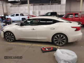 2016 Nissan Maxima SL with VIN 1N4AA6AP2GC399721, listed as a IAAI auction lot 41818252 with 64,386 mi miles and . Bid and sale history available at DreamBid. Image 14.