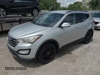 2013 Hyundai Santa Fe Sport z VIN 5XYZUDLA8DG055576, wystawiony jako IAAI lot #42392636 z przebiegiem 165 096 mil mil oraz . Historia ofert i sprzedaży dostępna na DreamBid. Obrazek 2.