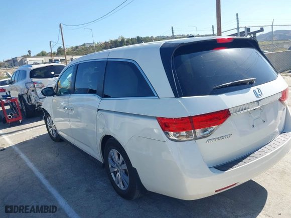 2016 Honda Odyssey EX-L with VIN 5FNRL5H65GB055916, listed as a IAAI auction lot 41980339 with 87,497 mi miles. Bid and sale history available at carsss.com. Image 3.