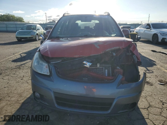 2009 Suzuki SX4 Touring AWD z VIN JS2YB417X96201551, wystawiony jako Copart lot #56630665 z przebiegiem 109 297 mil mil oraz Szkoda całkowita • Salvage title. Historia ofert i sprzedaży dostępna na DreamBid. Obrazek 5.
