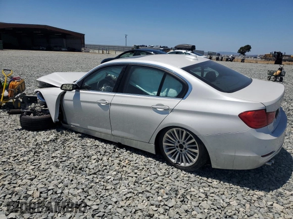 2014 BMW 3 Series 328i with VIN WBA3C1C53EK112799, listed as a Copart auction lot 61493585 with Not provided miles and Salvage title. Bid and sale history available at DreamBid. Image 2.