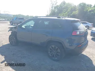 2021 Jeep Cherokee Latitude Lux z VIN 1C4PJMMX8MD205199, wystawiony jako IAAI lot #42556584 z przebiegiem 32 787 mil mil oraz . Historia ofert i sprzedaży dostępna na DreamBid. Obrazek 3.