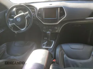 2014 Jeep Cherokee Trailhawk with VIN 1C4PJMBS1EW161642, listed as a Copart auction lot 46672345 with 196,908 mi miles and Salvage Title. Bid and sale history available at carsss.com. Image 8.