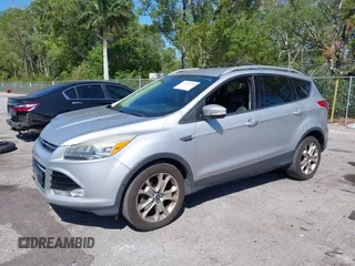2016 Ford Escape Titanium with VIN 1FMCU0JX2GUC39416, listed as a IAAI auction lot 41793375 with 146,877 mi miles. Bid and sale history available at carsss.com. Image 2.