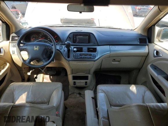 2005 Honda Odyssey EX-L with VIN 5FNRL38735B040552, listed as a Copart auction lot 57435355 with 183,768 mi miles and Salvage title. Bid and sale history available at DreamBid. Image 8.