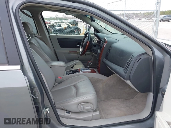 2005 Cadillac SRX with VIN 1GYEE63A550186151, listed as a IAAI auction lot 41494999 with 64,185 mi miles. Bid and sale history available at carsss.com. Image 5.