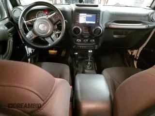 2018 Jeep Wrangler JK Unlimited Sport S with VIN 1C4BJWDG8JL828961, listed as a Copart auction lot 80446474 with 74,577 mi miles and Salvage Title. Bid and sale history available at carsss.com. Image 8.