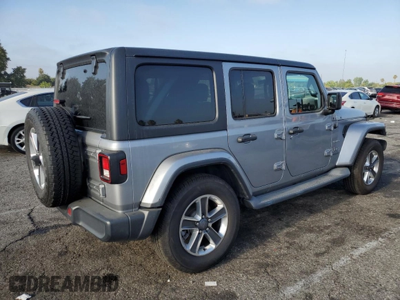 2019 Jeep Wrangler Unlimited Sahara with VIN 1C4HJXEN0KW616942, listed as a Copart auction lot 63501755 with 57,095 mi miles and Salvage title. Bid and sale history available at DreamBid. Image 3.