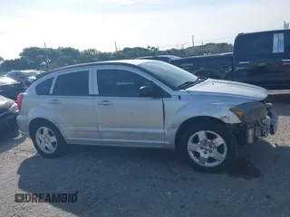 2009 Dodge Caliber SXT with VIN 1B3HB48A39D142674, listed as a IAAI auction lot 41642867 with 156,504 mi miles and . Bid and sale history available at carsss.com. Image 14.