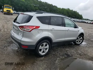 2013 Ford Escape SE with VIN 1FMCU0GX7DUA57262, listed as a Copart auction lot 59088705 with 157,201 mi miles and Salvage title. Bid and sale history available at DreamBid. Image 3.