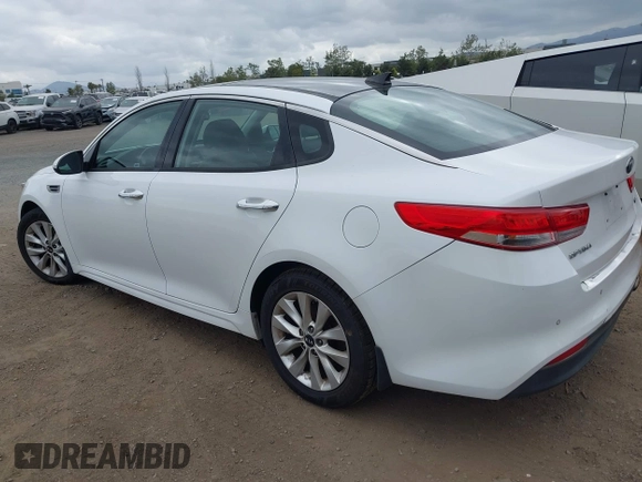 2016 Kia Optima EX with VIN 5XXGU4L31GG086203, listed as a IAAI auction lot 42128099 with 157,988 mi miles. Bid and sale history available at carsss.com. Image 3.
