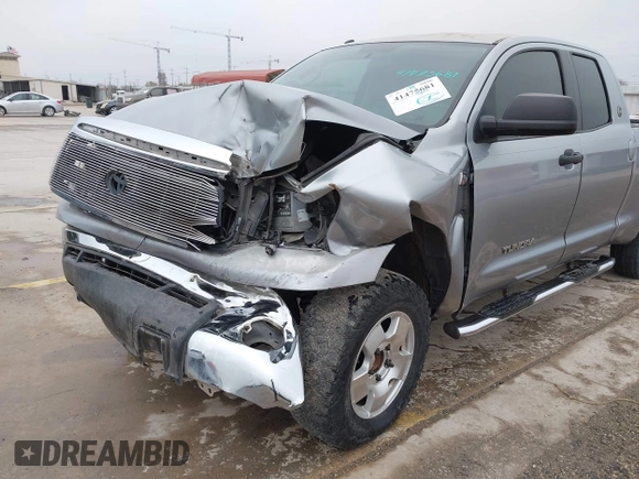 2012 Toyota Tundra z VIN 5TFRY5F18CX121917, wystawiony jako IAAI lot #41475681 z przebiegiem 166 507 mil mil oraz . Historia ofert i sprzedaży dostępna na DreamBid. Obrazek 6.