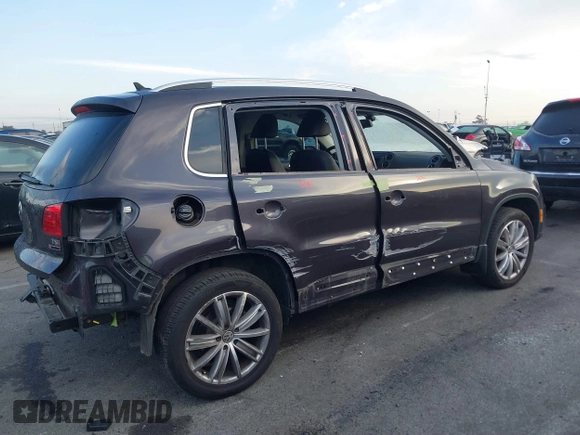 2016 Volkswagen Tiguan S with VIN WVGBV7AX5GW568438, listed as a IAAI auction lot 41434616 with 91,341 mi miles and . Bid and sale history available at DreamBid. Image 14.