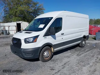 2023 Ford Transit Cargo Van with VIN 1FTBR2C8XPKA33372, listed as a IAAI auction lot 41735299 with 56,777 mi miles. Bid and sale history available at carsss.com. Image 21.