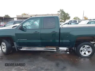 2014 Chevrolet Silverado 1500 LT with VIN 1GCVKREC7EZ312679, listed as a IAAI auction lot 40874395 with 153,234 mi miles and . Bid and sale history available at DreamBid. Image 14.