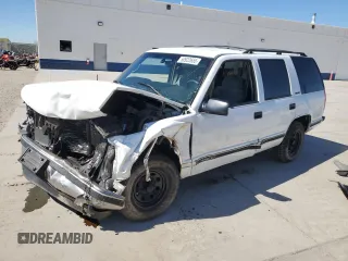 1999 GMC Yukon with VIN 1GKEC13R4XJ809507, listed as a Copart auction lot 50922655 with 227,923 mi miles and Salvage Title. Bid and sale history available at carsss.com. Image 1.