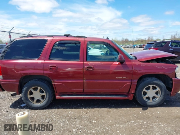 2003 GMC Yukon Denali z VIN 1GKEK63U43J285497, wystawiony jako IAAI lot #42156401 z przebiegiem 301 788 mil mil oraz . Historia ofert i sprzedaży dostępna na DreamBid. Obrazek 14.