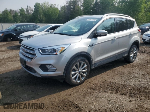2018 Ford Escape Titanium с VIN 1FMCU9J9XJUD44928, выставлен на аукционе Copart как лот 59675445 с пробегом 37 485 миль миль и Чистый • Clean title. История ставок и продаж доступна на DreamBid. Изображение 1.