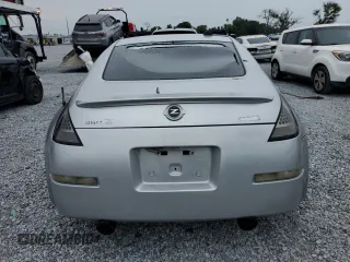 2004 Nissan 350Z Touring z VIN JN1AZ34E84T063971, wystawiony jako Copart lot #57267825 z przebiegiem 131 036 mil mil oraz Szkoda całkowita • Salvage title. Historia ofert i sprzedaży dostępna na DreamBid. Obrazek 6.