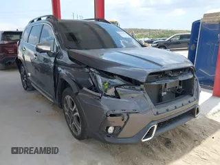 2023 Subaru Ascent Touring z VIN 4S4WMAWD3P3402355, wystawiony jako IAAI lot #42344573 z przebiegiem 35 129 mil mil oraz . Historia ofert i sprzedaży dostępna na DreamBid. Obrazek 1.