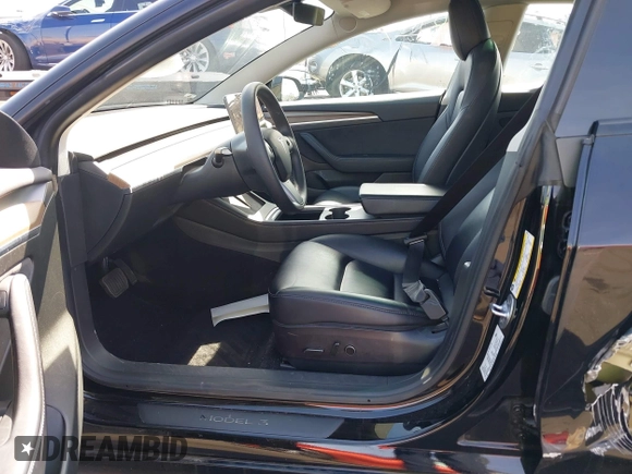 2022 Tesla Model 3 Long Range with VIN 5YJ3E1EB1NF133356, listed as a IAAI auction lot 41568303 with 73,406 mi miles and . Bid and sale history available at DreamBid. Image 5.