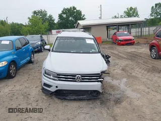 2018 Volkswagen Tiguan S with VIN 3VV1B7AX0JM041120, listed as a IAAI auction lot 42219662 with 160,852 mi miles and . Bid and sale history available at DreamBid. Image 12.