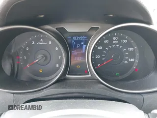 2014 Hyundai Veloster with VIN KMHTC6AD2EU184927, listed as a IAAI auction lot 42133499 with 103,499 mi miles. Bid and sale history available at carsss.com. Image 7.