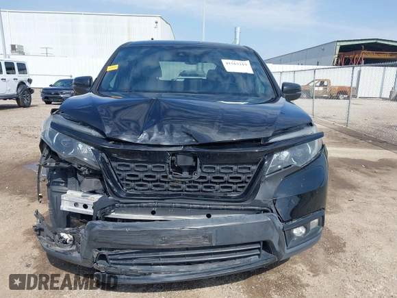 2019 Honda Passport EX-L with VIN 5FNYF7H59KB003011, listed as a IAAI auction lot 41563219 with 78,239 mi miles and . Bid and sale history available at carsss.com. Image 12.