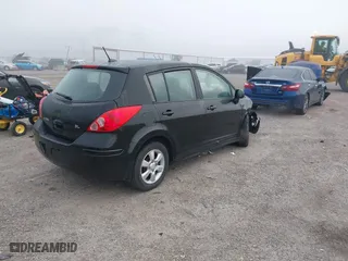 2009 Nissan Versa 1.8 S with VIN 3N1BC13E99L423269, listed as a IAAI auction lot 41490644 with 124,241 mi miles. Bid and sale history available at carsss.com. Image 4.