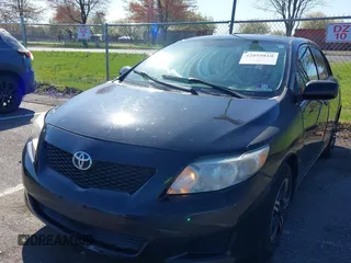 2010 Toyota Corolla with VIN 2T1BU4EE0AC291034, listed as a IAAI auction lot 42059810 with 132,363 mi miles. Bid and sale history available at carsss.com. Image 2.