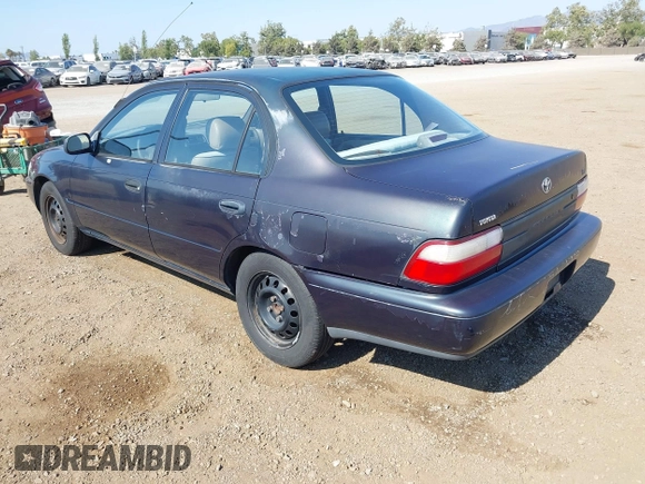 1997 Toyota Corolla with VIN 1NXBA02E7VZ601593, listed as a IAAI auction lot 42771723 with 247,823 mi miles and . Bid and sale history available at DreamBid. Image 3.