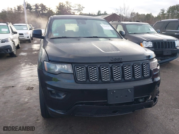 2021 Jeep Grand Cherokee Laredo X with VIN 1C4RJFAG6MC599672, listed as a IAAI auction lot 41323741 with 71,491 mi miles. Bid and sale history available at carsss.com. Image 12.