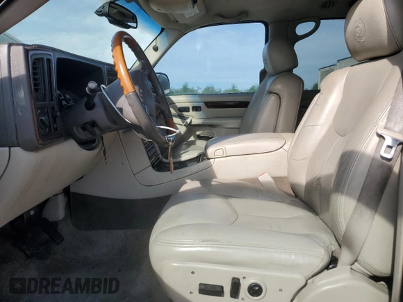 2003 Cadillac Escalade z VIN 1GYEK63N93R143629, wystawiony jako Copart lot #50333955 z przebiegiem 102 828 mil mil oraz Szkoda całkowita • Salvage title. Historia ofert i sprzedaży dostępna na DreamBid. Obrazek 7.