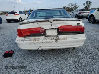 1994 Ford Thunderbird LX with VIN 1FALP62W6RH206764, listed as a Copart auction lot 44213965 with 105,353 mi miles and Salvage Title. Bid and sale history available at DreamBid. Image 6.