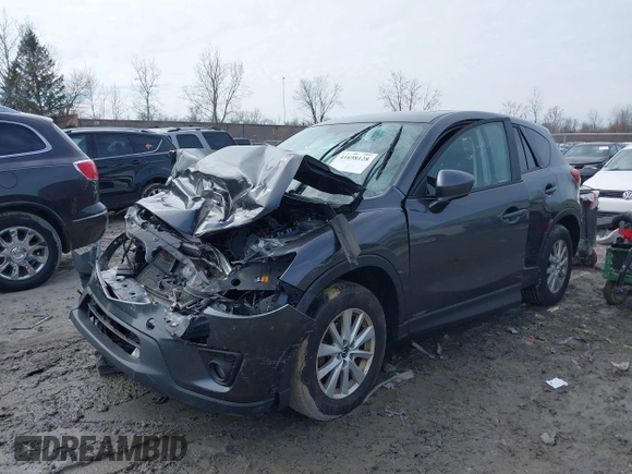 2014 Mazda CX-5 Touring with VIN JM3KE4CY6E0387767, listed as a IAAI auction lot 41698128 with 1 mi miles. Bid and sale history available at carsss.com. Image 2.