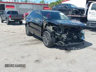 2024 Cadillac XT4 FWD Sport with VIN 1GYFZER44RF247318, listed as a IAAI auction lot 42517171 with 5,205 mi miles and . Bid and sale history available at DreamBid. Image 1.