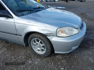 1999 Honda Civic HX with VIN 1HGEJ7122XL020224, listed as a IAAI auction lot 41723460 with 202,759 mi miles. Bid and sale history available at carsss.com. Image 6.